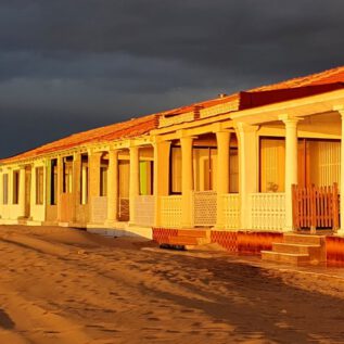 In the 1970s illegal built Beach Barracks at Sunrise before DeparturE